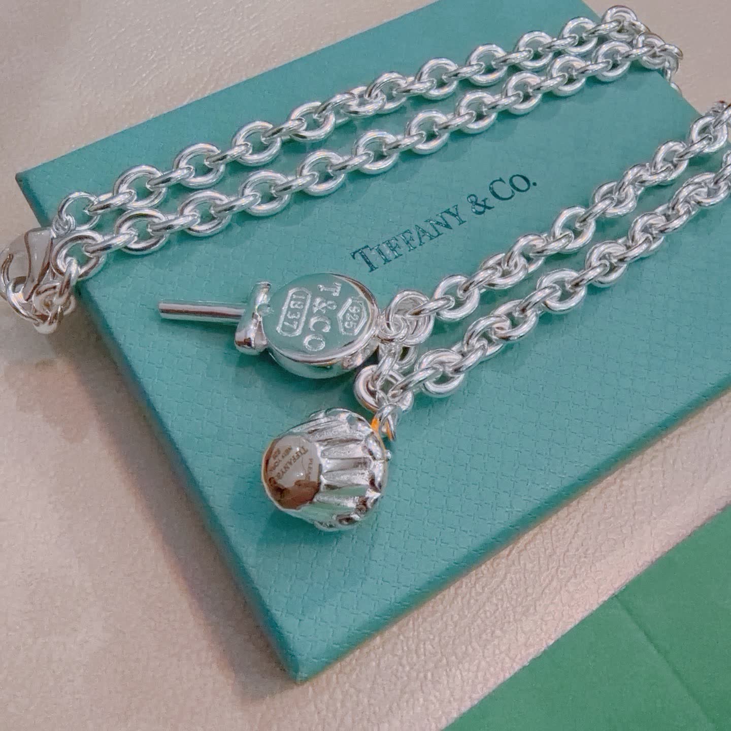 Tiffany & Co. Silver Charm Necklace with Lollipop and Cupcake Charms